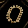 Gold Tone Floral Statement Bracelet Gold Tone Floral Statement Bracelet | Elviah