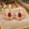 Ruby Oval Halo Earrings (1) Red Ruby Style Halo Earrings